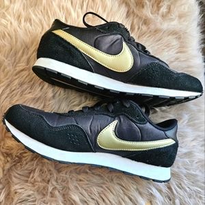 Nike, black and gold sneaker, size 6Y or 8 womens